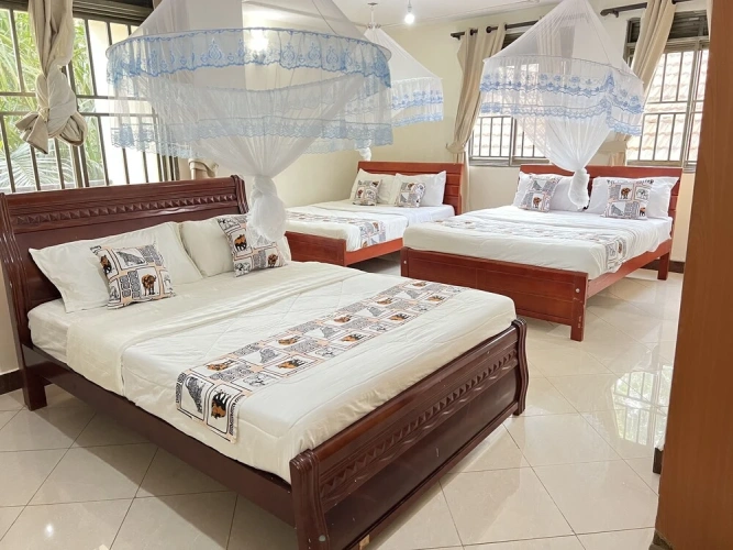 Standard Triple room with balcony and with garden view