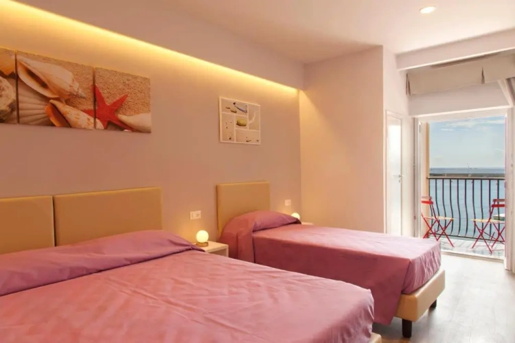 Standard Quadruple room with balcony and with sea view