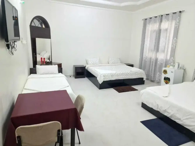 Standard Quadruple room with courtyard view