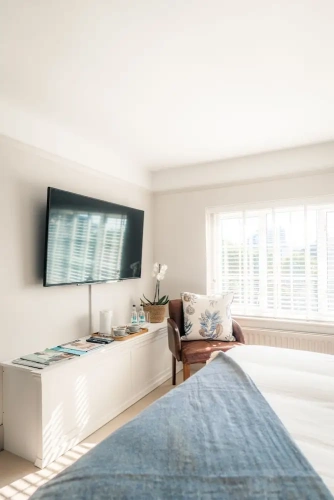 Deluxe Quadruple room with courtyard view