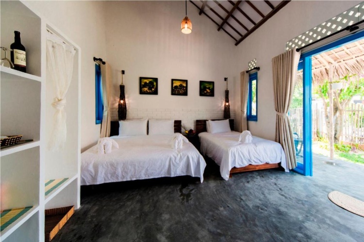 Standard Triple room with garden view