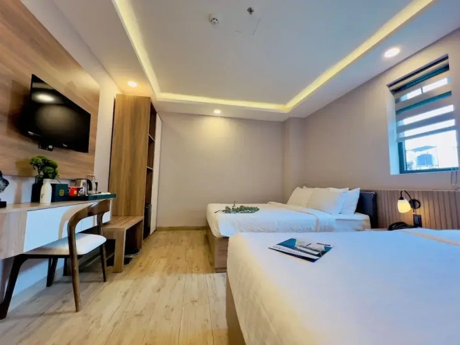 Standard Triple room with courtyard view