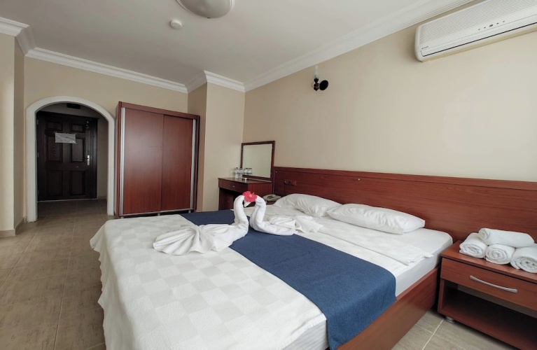 Comfort Triple room with balcony and with pool view