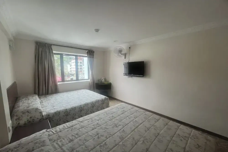 Deluxe Quadruple room with balcony