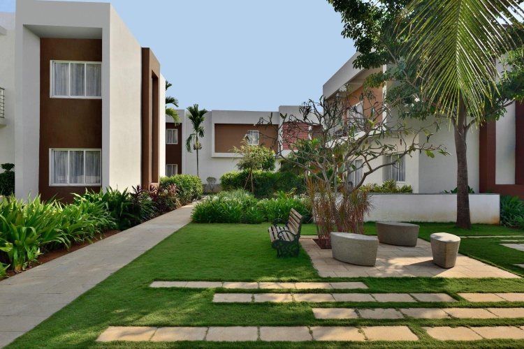Standard Twin room with balcony and with garden view