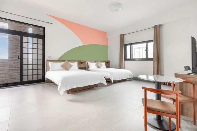 Deluxe Quadruple room with balcony