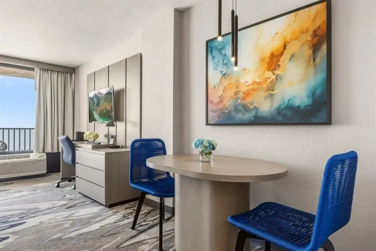 Standard Quadruple room with balcony and with partial ocean view