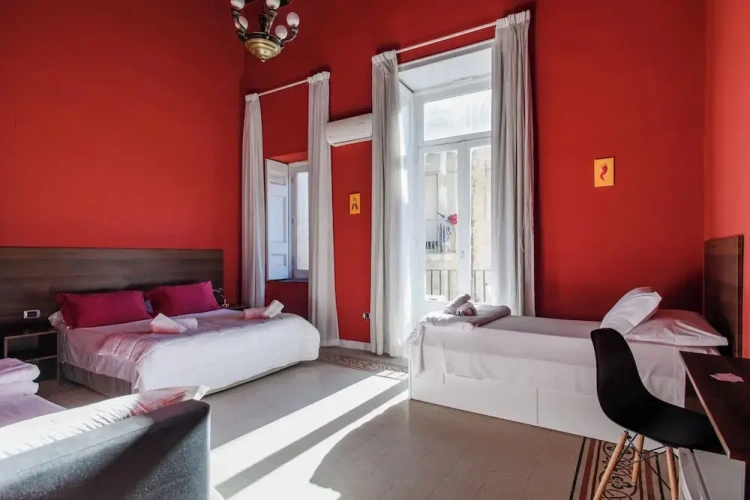 Deluxe Quadruple room with balcony
