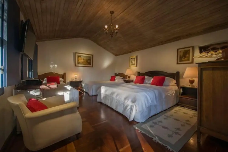Standard Quadruple room with garden view