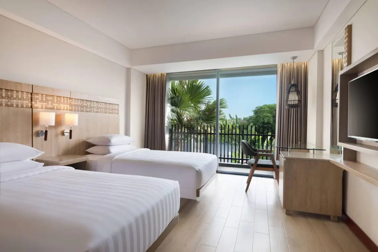 Twin room with balcony and with pool view