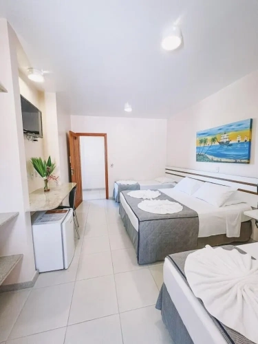 Deluxe Quadruple room with balcony