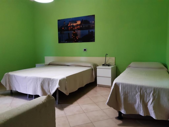 Standard Triple room with garden view