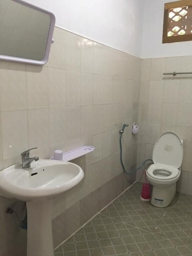 Deluxe Triple room with balcony and with garden view