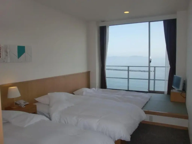 Standard Triple room with sea view