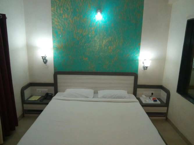 Deluxe Quadruple room with balcony