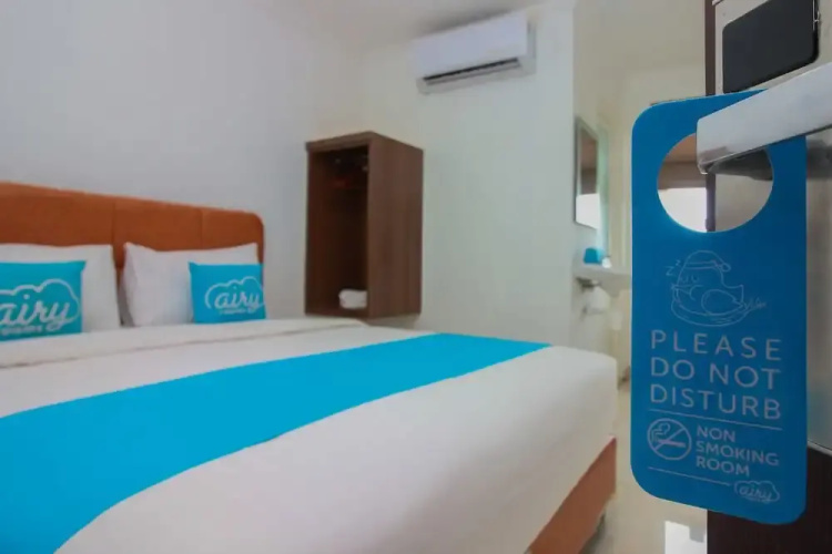 Airy Mapanget AA Maramis Manado