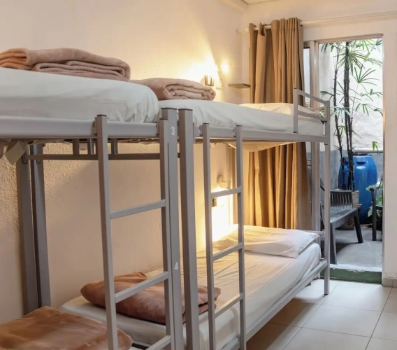Bed in Dorm (female dorm) with balcony