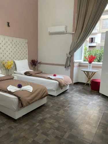 Deluxe Quadruple room with city view