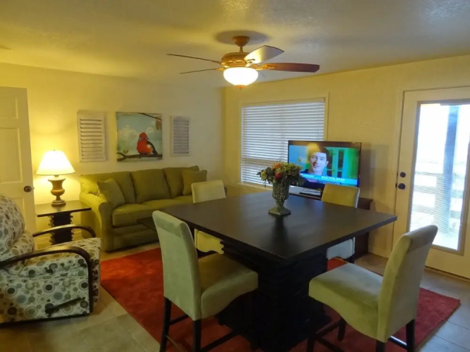 Poolside King Cabana with full kitchen, king bed, sleeper sofa and pool access. by RedAwning