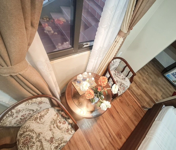 Standard Quadruple Family room with balcony and with garden view