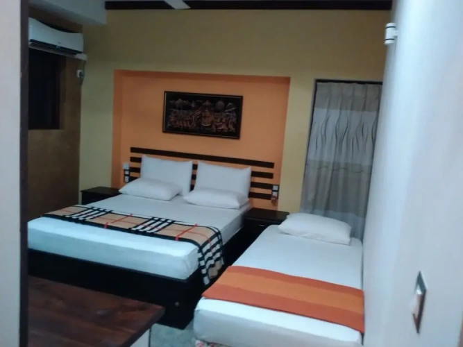 Deluxe Triple room with garden view