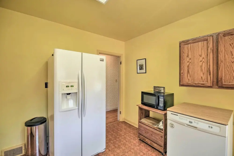Quaint Creekside Home w/ Spacious Deck & Yard