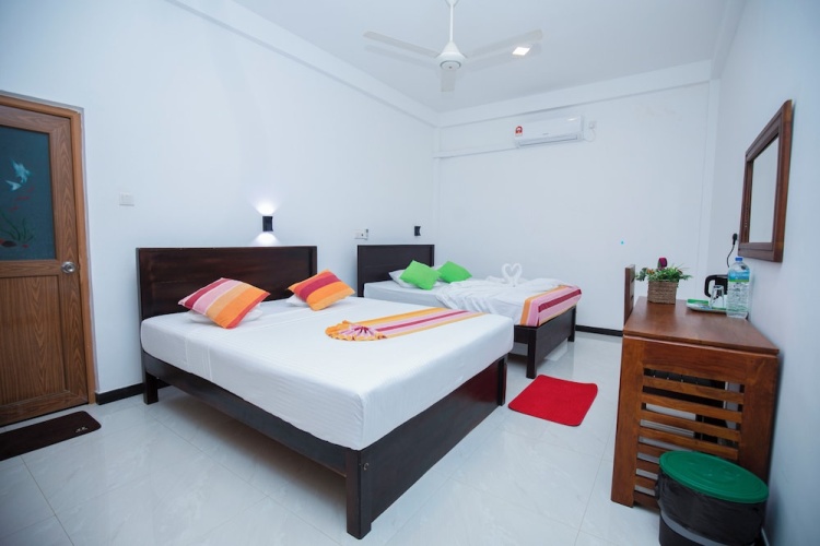 Deluxe Quadruple room with garden view
