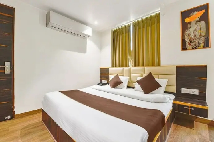 Fabhotel Prime Kaki