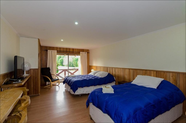 Standard Triple room with garden view