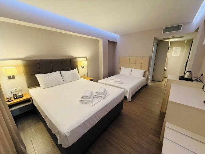 Deluxe Quadruple room with balcony
