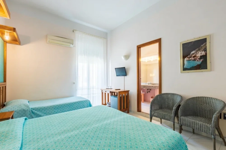 Superior Triple room with balcony and with sea view