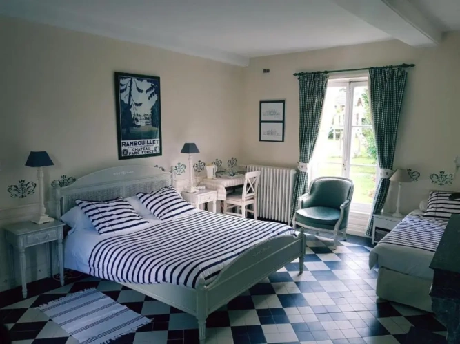 Standard Triple room with garden view