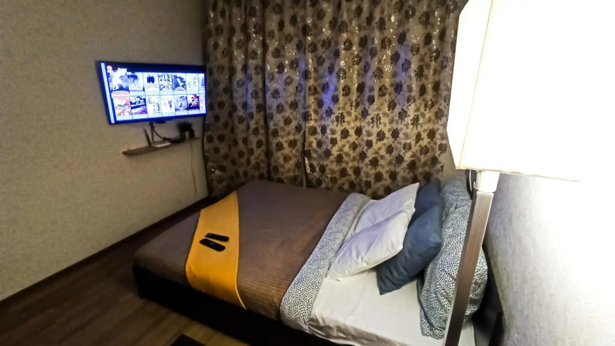 Фотография номера квартиры Диван и чемодан на улице Дуси Ковальчук 185Б