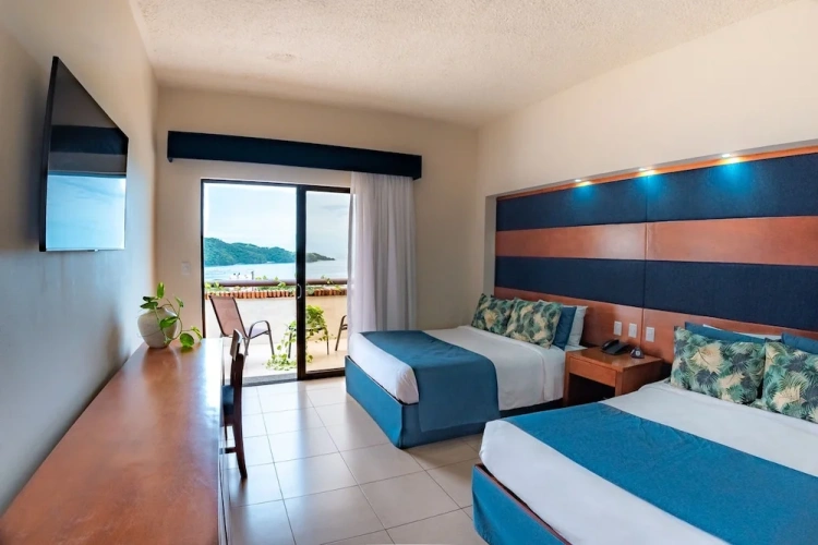 Deluxe Quadruple room with balcony