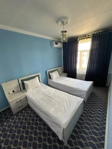 Фотография номера гостиницы Akmal