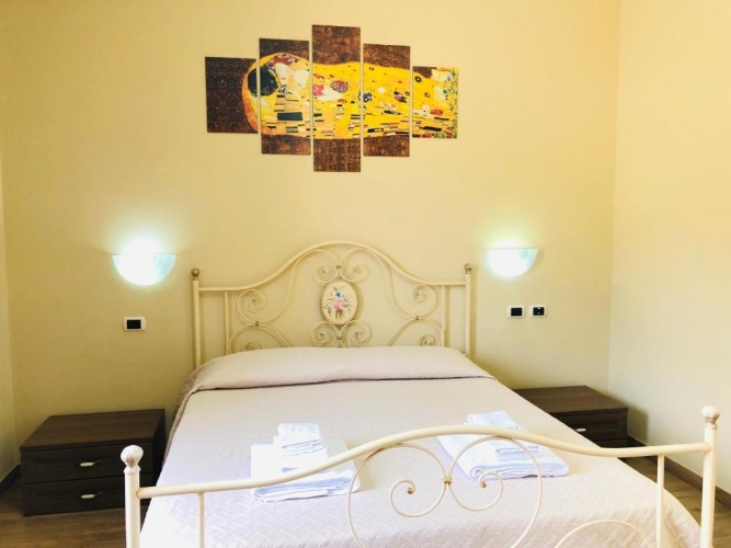 Standard Triple room with garden view