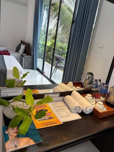 Deluxe Triple room with balcony and with land view