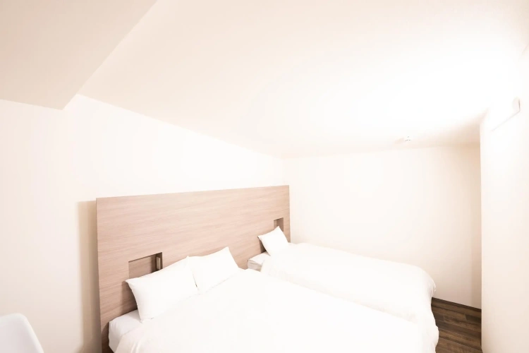 Standard Triple room with garden view