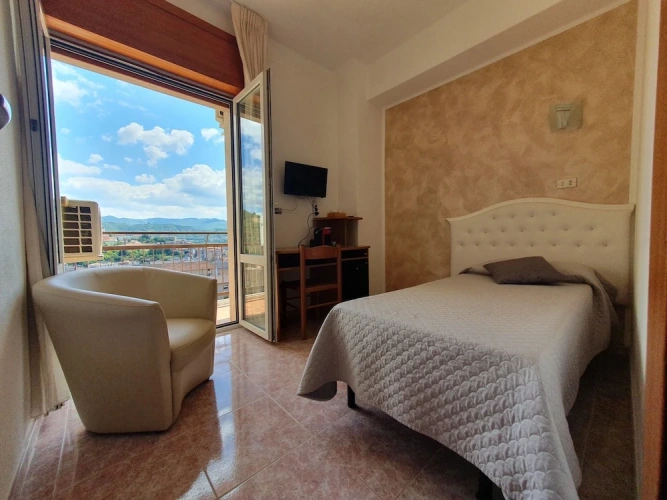 Standard Triple room with balcony