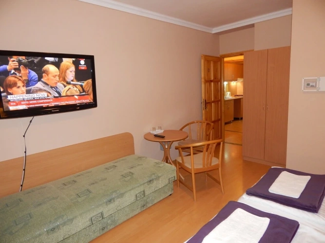 Standard Triple room with balcony and with garden view