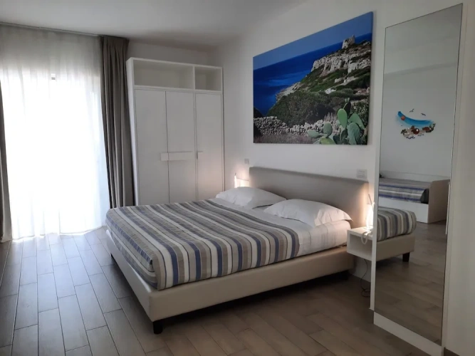 Standard Triple room with balcony and with partial sea view