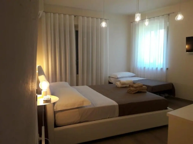 Standard Triple room with garden view
