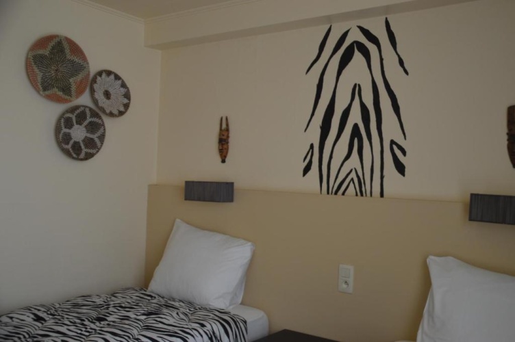 Standard Twin room with garden view