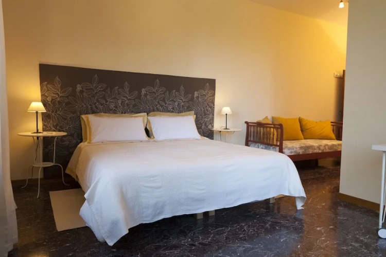 Standard Triple room with balcony and with garden view