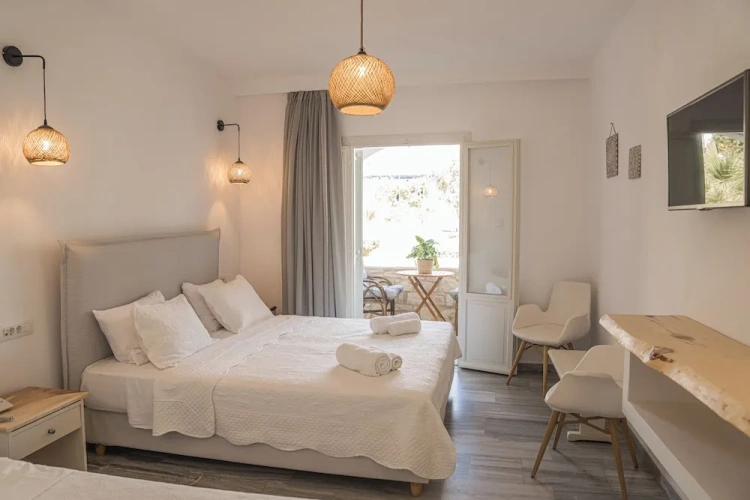 Standard Triple room with balcony and with garden view