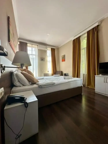 Standard Twin room with balcony and with city view