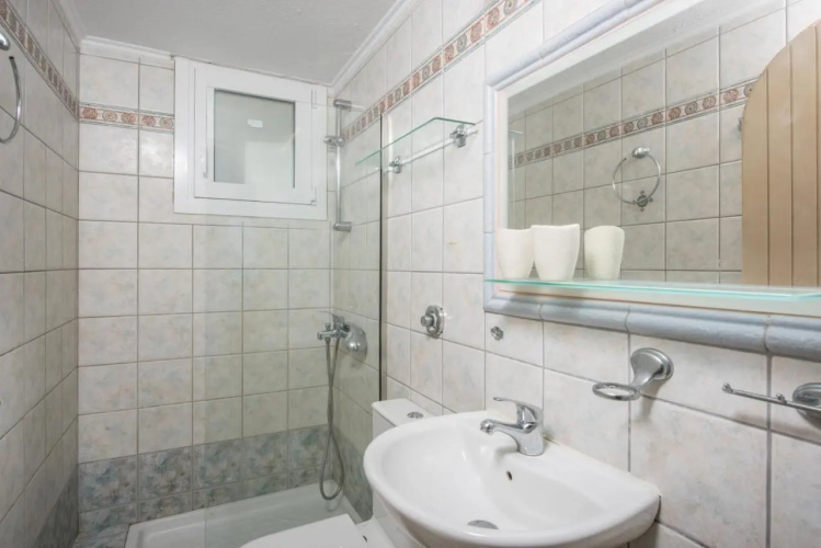 Exclusive Seaside Retreat with Shared Pool & Private Beach Access