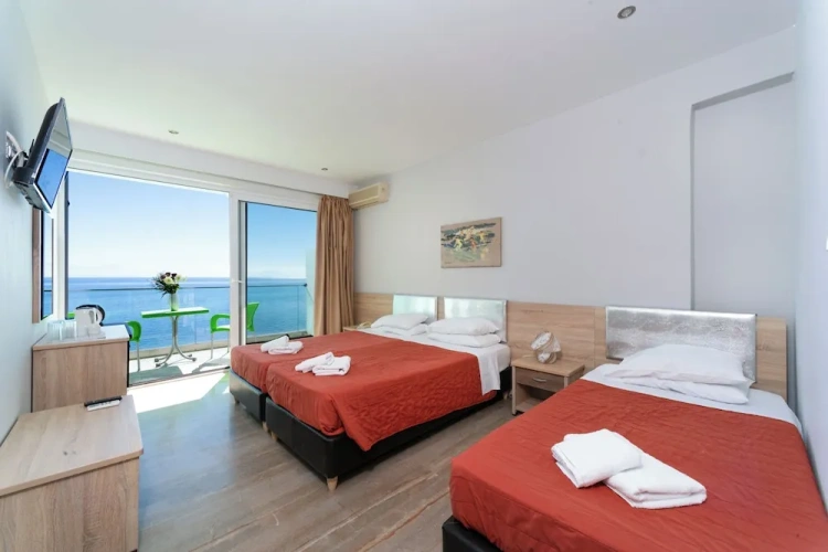 Standard Triple room with balcony and with sea view
