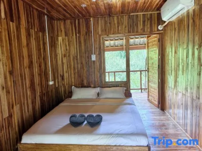 Bed in Dorm (male dorm) with balcony and with river view