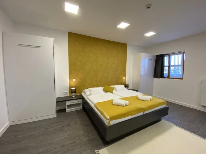 Deluxe Quadruple room with balcony
